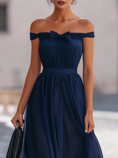 Off-Shoulder Bow Pleated Flowing Maxi Dress
