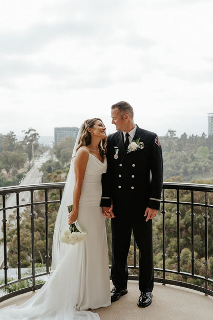 Charming Mermaid Spaghetti Straps White Long Wedding Dress with Sweep Train