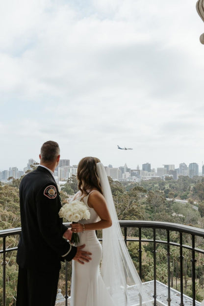Charming Mermaid Spaghetti Straps White Long Wedding Dress with Sweep Train