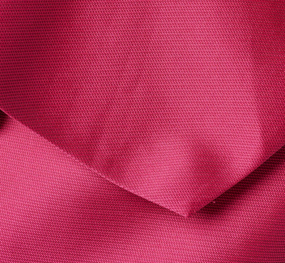 Strapless Asymmetrical Peplum Gown In Bright Rose