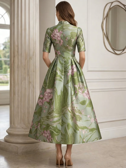 A-Line Printed Satin Mother of the Bride Dresses with Bowknot Floral Tea-Length Half Sleeves