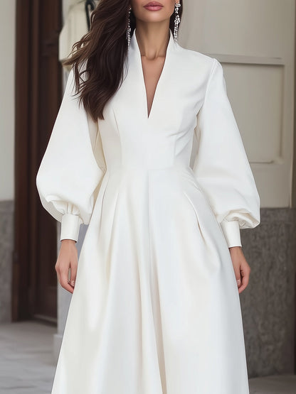 Elegant Long-Sleeve A-Line Dress With Pleated Skirt